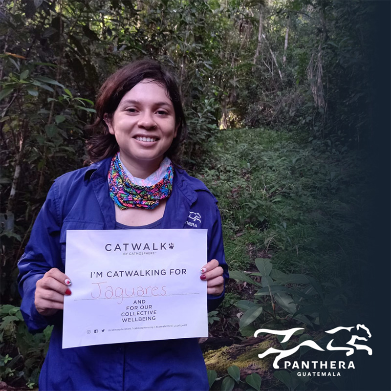 "Researcher holding sign"