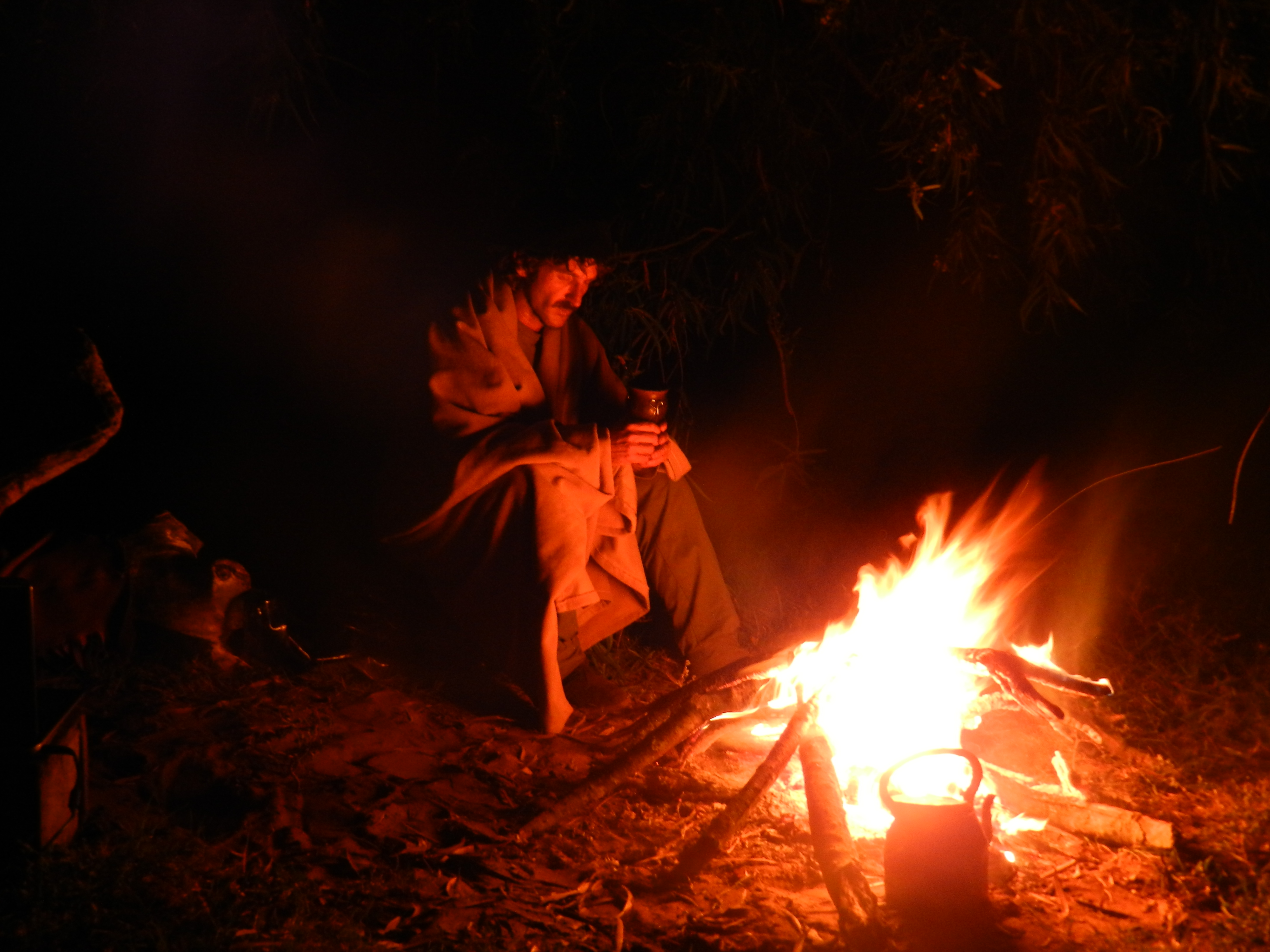 Drinking mate while watching fire