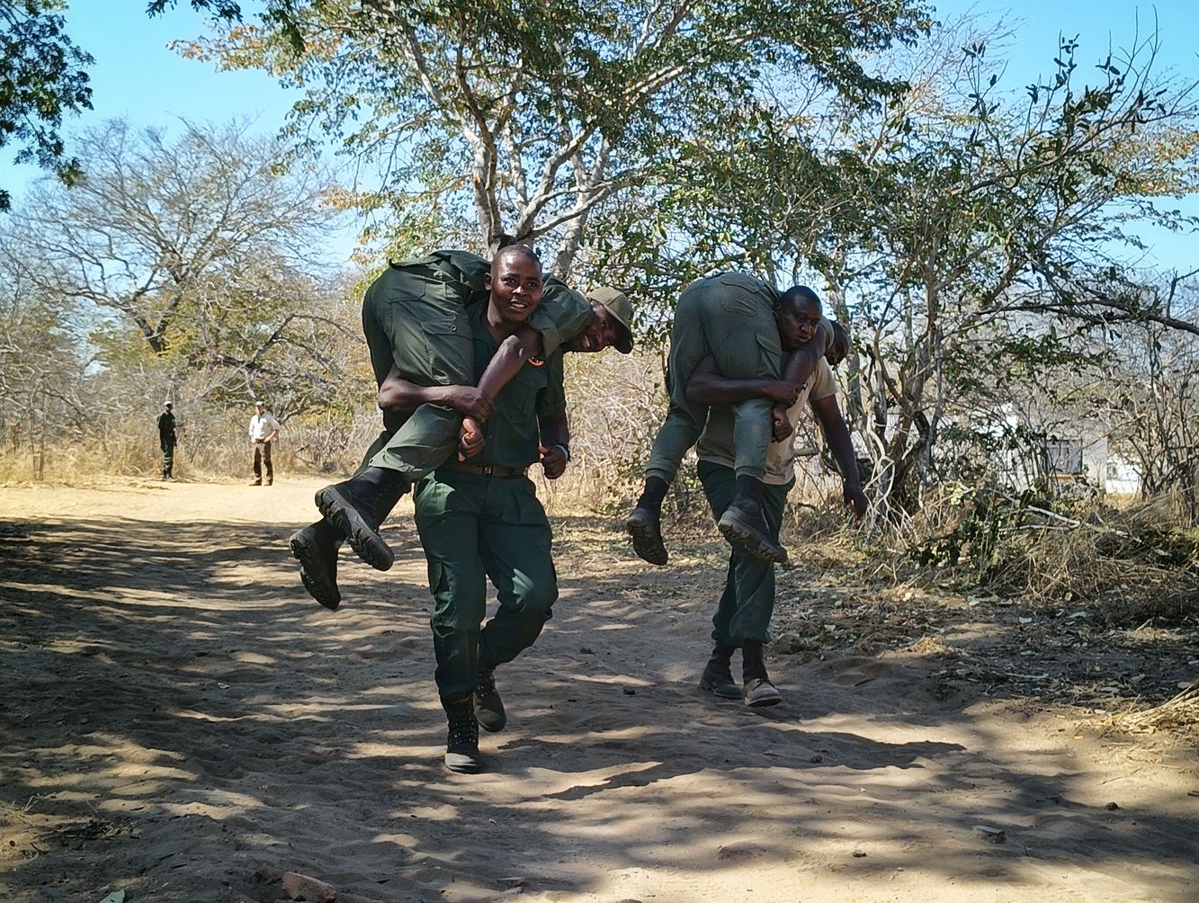Rangers practice fireman carry in Hwange National Park