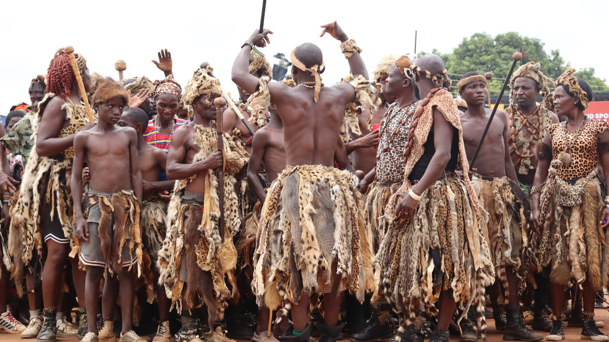 Group of dancers wear leopard, serval and other wildlife skins